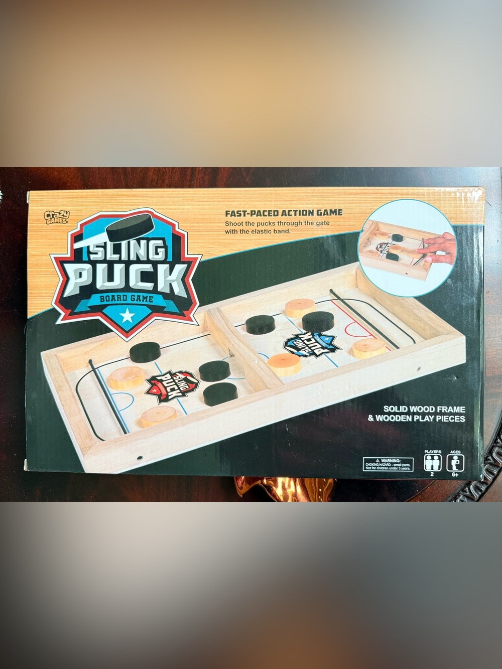 Sling Puck Wooden Board Game - Natural Wood with Black & Tan Pucks